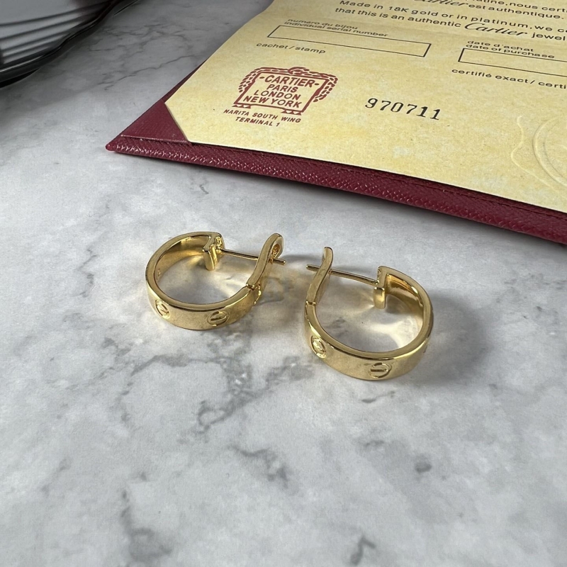 Ca*t*er earrings